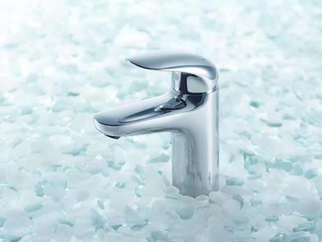 Faucet Over Pebbles
